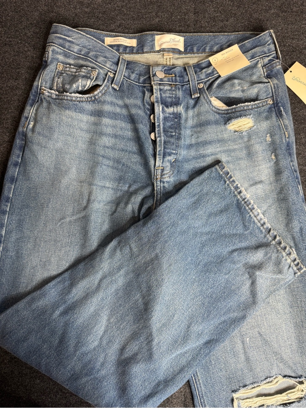 New women’s size 8 mid rise 90’s baggy Distressed Jeans